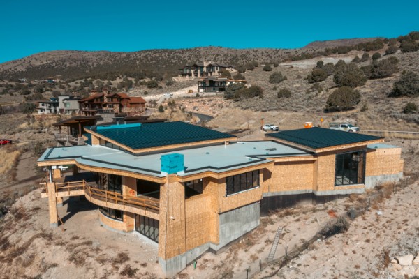 Commercial metal roofing project with mountain views
