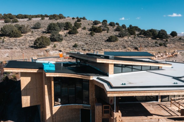 Low-slope roof and metal roof sections in progress