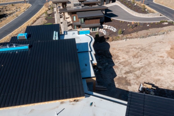Aerial view of standing seam metal roof installation